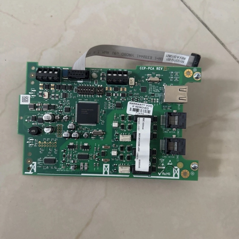 HONEYWELL IPOTS-COM Digital
Communicator With Ribbon Connector, And Ports.